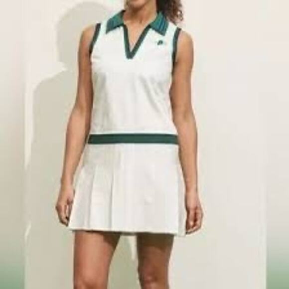 The product shown is the Prince Pickleball Women's Collared Pleated Dress - Picture 1 of 3